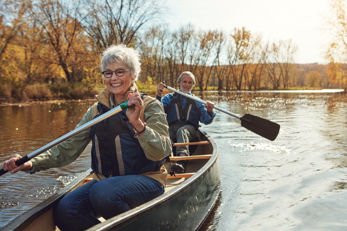 kayak with old happy couple